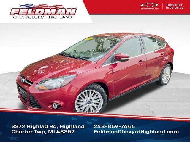 2013 Ford Focus Titanium in Red — front three-quarter view