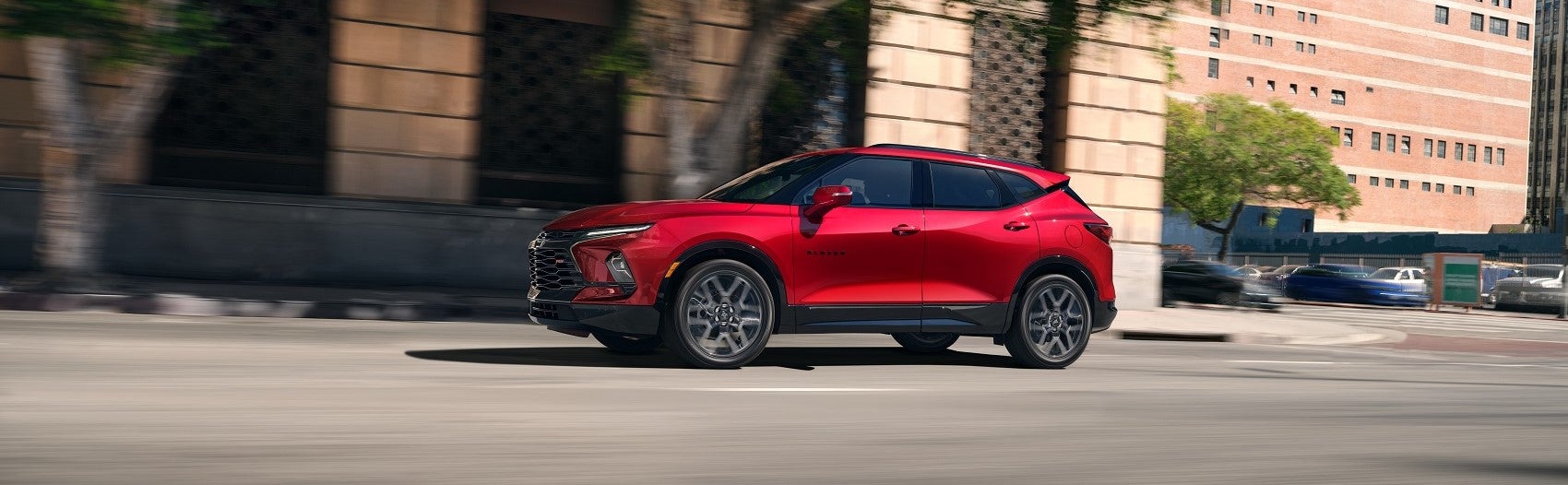 red chevy blazer drives down city street novi michigan